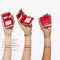 Valentino Beauty Go-Clutch Refillable Compact Powder swatched on fair, medium, and deep skin. 