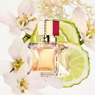 Valentino Beauty Voce Viva Eau De Parfum surrounded by bergamot and vanilla bean