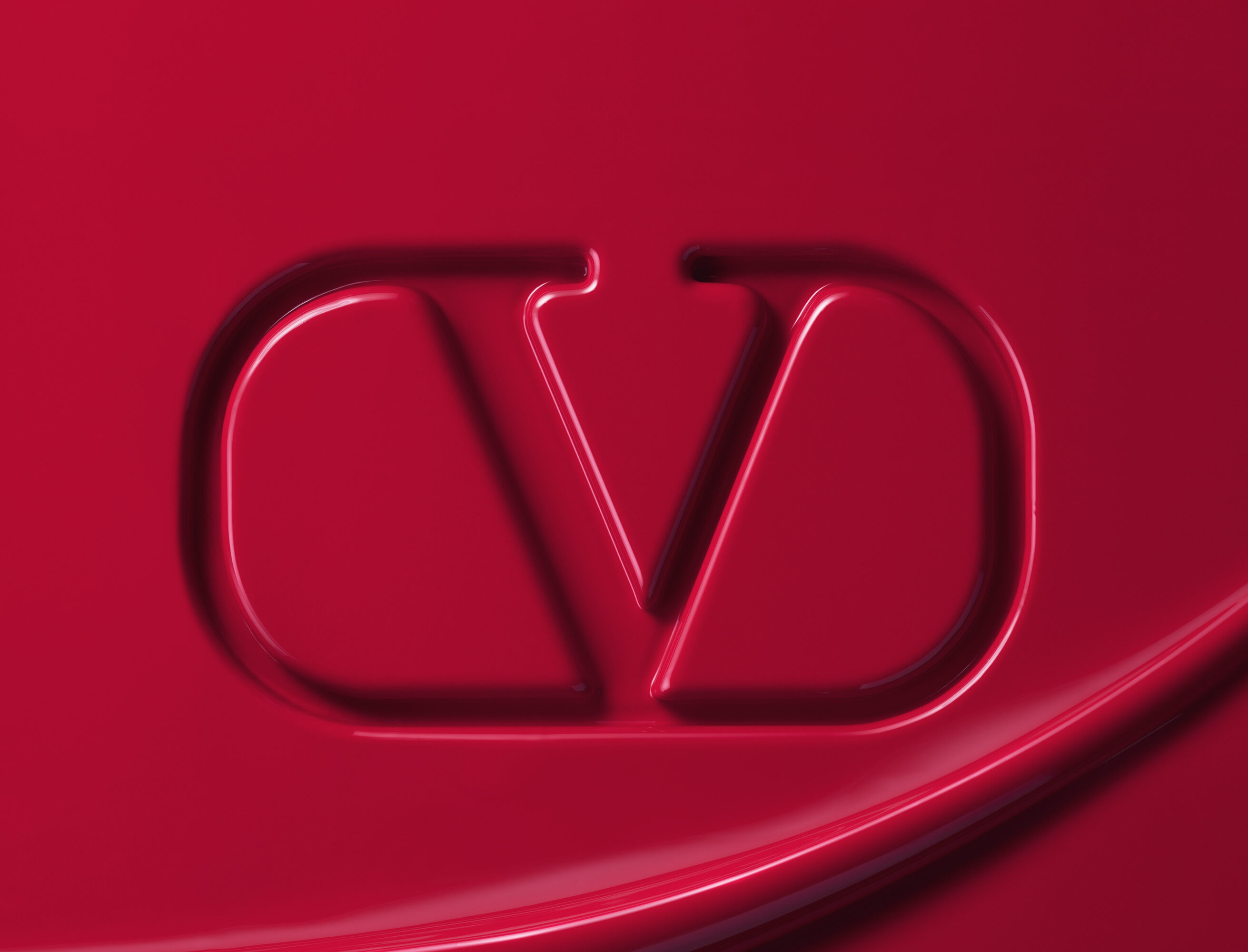 The Valentino Beauty logo in red