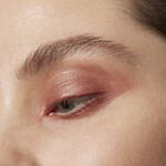 Close-up of an eye with mauve eyeshadow