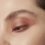 Close-up of an eye with mauve eyeshadow