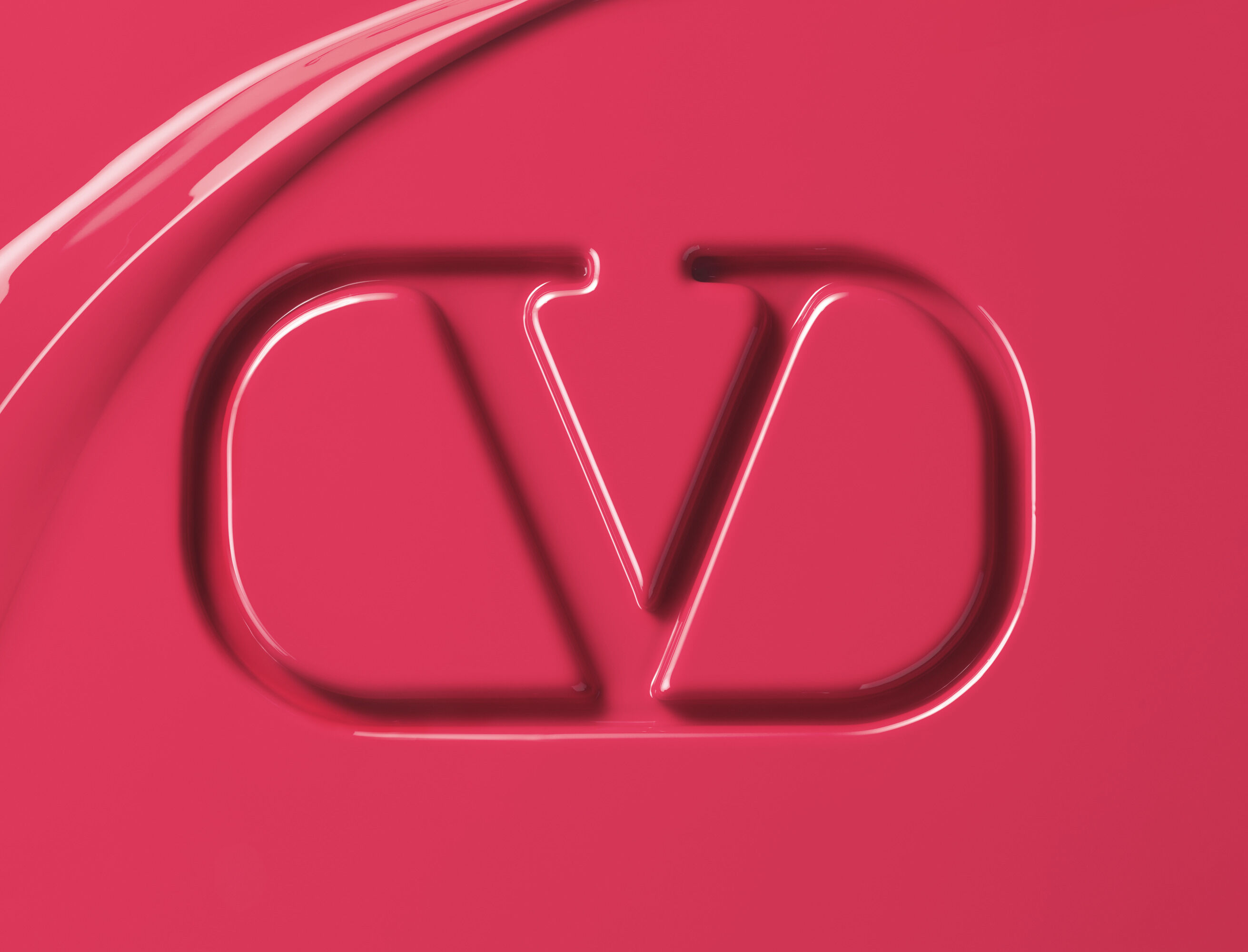 Valentino Beauty logo embossed in pink lipstick