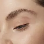 Close-up of an eye with sheer eye makeup