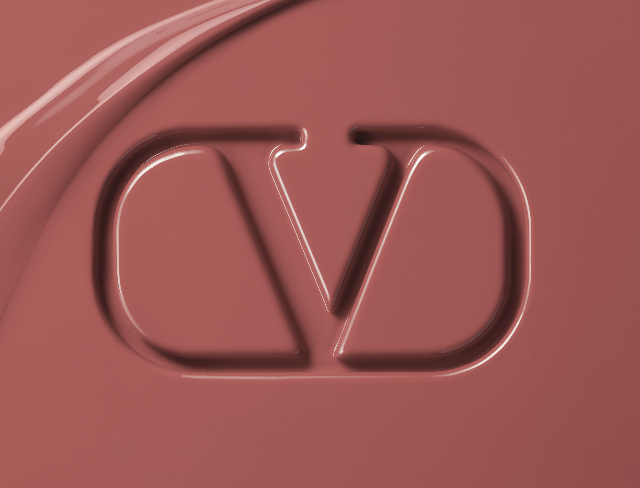 Valentino Beauty logo embossed in nude lipstick formula